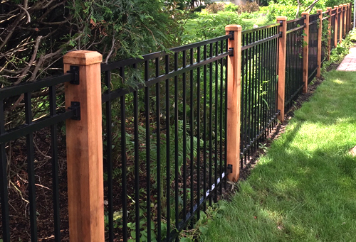 aluminum fence with cedar posts